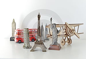 Travel and tourism concept with souvenirs from around the world