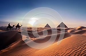 Travel tourist to pyramids in beautiful desert, AI generated photo