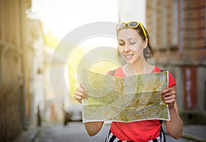 Travel tourist woman with map