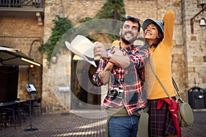 Travel tourists man and woman while enjoying in vacation