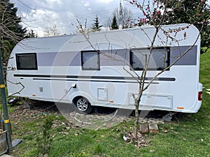 A travel trailer at a caravan camping site concept.