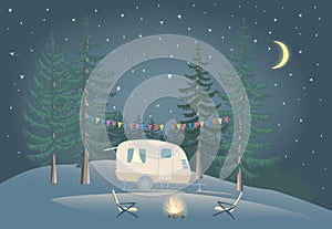 Travel Trailer in night forest with bonfire.