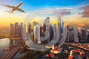 Travel, Transportation concept - Airplane flying over Singapore