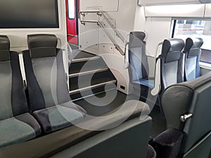 Travel, transportation and transport concept. Emtpy interior of the train with seat