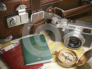 Travel or turism background concept. Old suitcase, passports