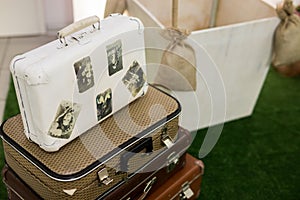 Travel or turism concept. Vintage suitcases with old photo