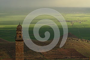 Travel turkey. Mardin. mardin grand mosque with mesopotamia plain. ancient city of mardin. sunset landscape