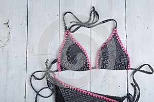 Travel and vacation concept - fashion swimsuit in polka dots