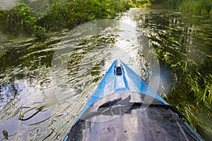 Travel and Vacation Ideas.  Prow of Kayak On River Outdoors During Summertime