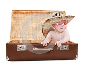 Travel, vacation and people concept - funny baby in sunglasses