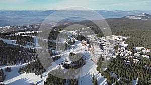 Travel and winter adventure concept. Aerial view of the ski resort. Kopaonik National Park, winter landscape in the