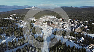 Travel and winter adventure concept. Aerial view of the ski resort. Kopaonik National Park, winter landscape in the