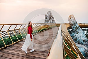 Travel woman at Golden Bridge in Ba Na Hills ,Danang Vietnam