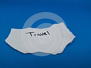 travel word handwritten on paper