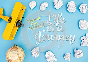 Travel The world Life is a journey with paper cloud and toy plane