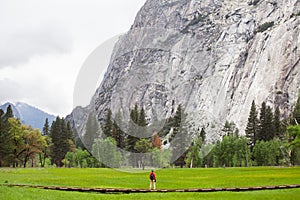 Travel in Yosemite National Park, man Hiker with backpack enjoying view, outdoor lifestyle, USA