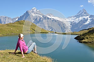 Traveler in the Alpine meadow