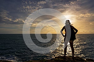 Traveler asia woman on sea cliff