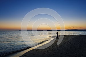 Traveler asian woman with her summer vacations on a twilight beach by the sea her fell lonely dramatic but freedom. Aegean Sea