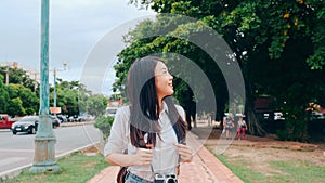 Traveler Asian woman spending holiday trip at Ayutthaya, Thailand, Japanese backpacker female enjoy her journey at amazing