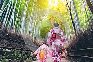 Traveler in Bamboo Forest Grove, Kyoto, Japan