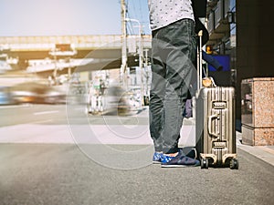 Traveler carry Luggage City street People travel concept