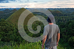 Traveler at Chocolate Hills in Bohol, Philippines