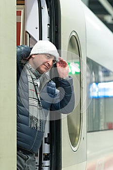 Traveler getting off the train