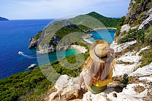 Traveler girl enjoying landscape from Porto Timoni Viewpoint in Corfu, Greece
