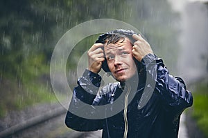 Traveler in heavy rain