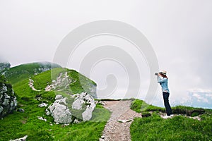 Traveler or hiker in the mountains in the National Park Triglav.