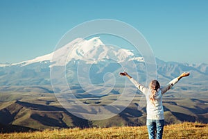 Traveler looking to Elbrus mountain