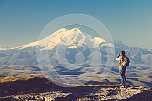 Traveler looking to Elbrus mountain