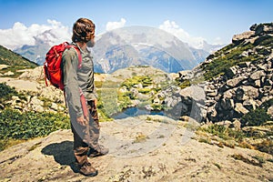 Traveler Man with backpack hiking