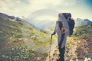 Traveler Man with backpack mountaineering