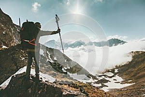 Traveler Man on mountain summit Travel lifestyle success