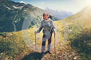 Traveler Man mountaineering with backpack