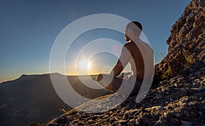 Traveler meditate on mountain