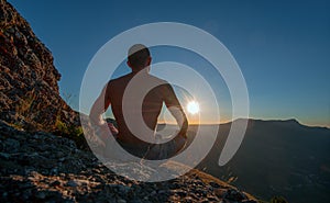 Traveler meditate on mountain