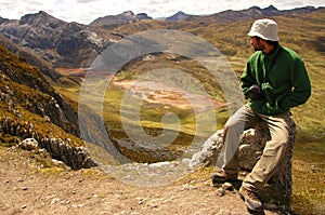 Traveler overlooking valley photo