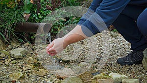 A traveler passing by has the opportunity to wash his hands and wash his face