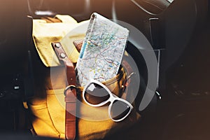 Traveler relax holiday concept, view planning way road in trip vacation, hipster hiker tourist yellow backpack closeup