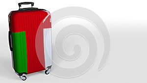 Traveler`s suitcase featuring flag of Oman. Omani tourism conceptual 3D rendering, blank space for caption