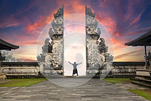 Traveler Standing at the Gates of Pura Lempuyang Temple aka Gates of Heaven Bali, Indonesia