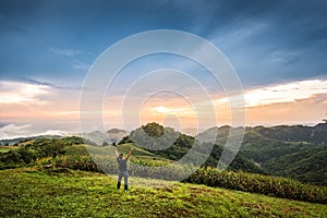 Traveler standing on the top of National Park in Nan, Thailand