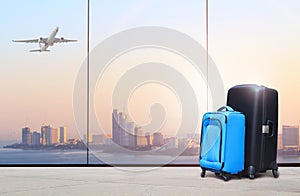 Traveler suitcases in airport terminal waiting area