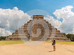 Traveler takes a photo of Pyramid in Chichen Itza, Temple of Kukulkan. Yucatan, Mexico