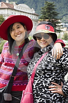 Traveler thai women mother and daughter playful travel and posing for take photo