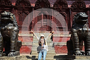 Traveler thai women photographer travel visit and work take photo ancient nepalese architecture and antique old ruin nepali royal