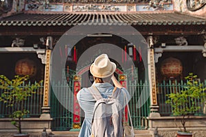 Traveler at Thien Hau Pagoda, dedicated to the Chinese sea goddess Mazu , in Cholon, the Chinatown area of Saigon